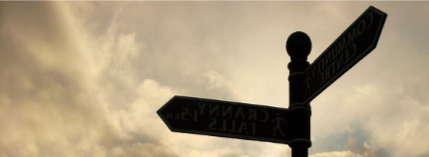 signpost against the sky